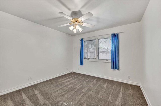 carpeted empty room with ceiling fan