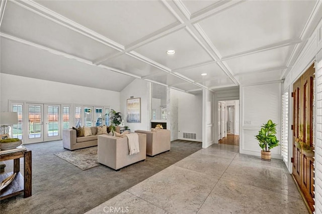 living room with coffered ceiling, french doors, carpet, and beam ceiling