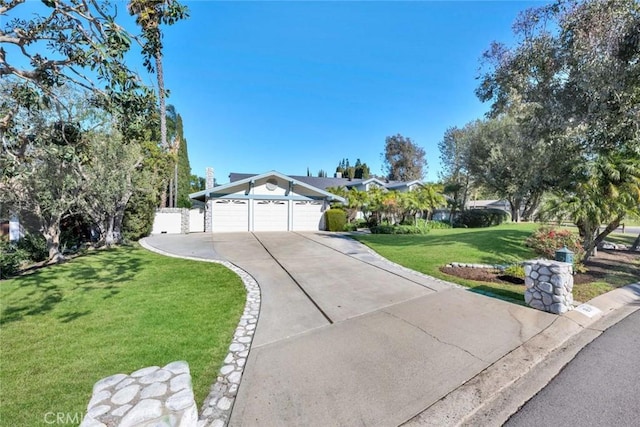 single story home with a front yard and a garage