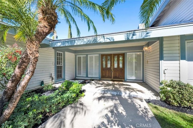 entrance to property with a patio area