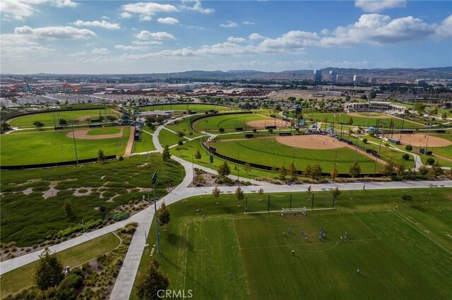 birds eye view of property featuring a mountain view