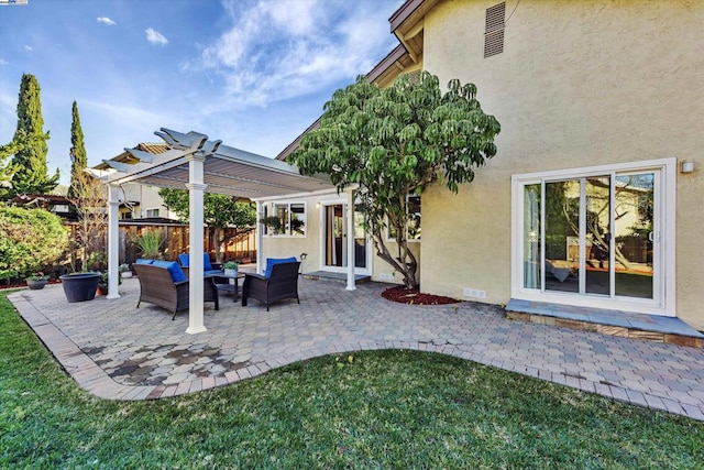 view of patio with a pergola and outdoor lounge area