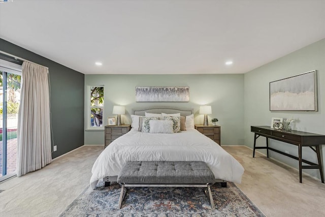 carpeted bedroom featuring access to outside