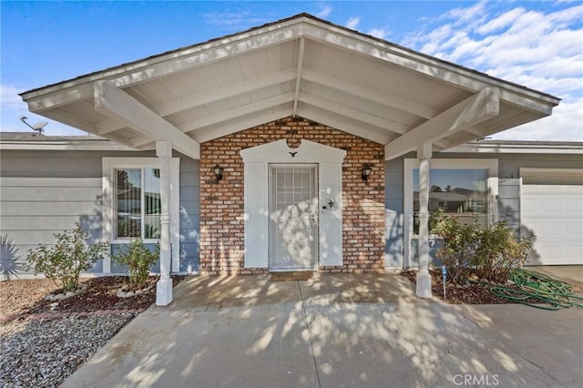 property entrance featuring a garage