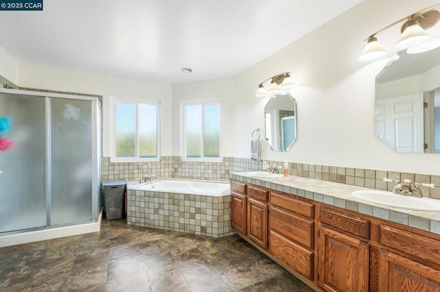 bathroom with backsplash, plus walk in shower, and vanity