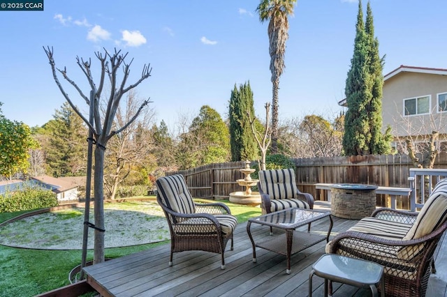 wooden terrace with a yard