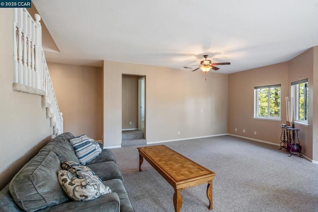 living room featuring ceiling fan and carpet floors