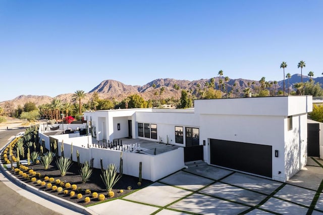 view of front of house with a mountain view