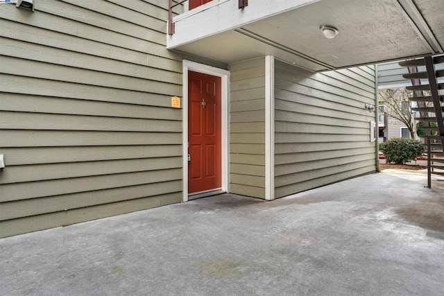 doorway to property featuring a patio