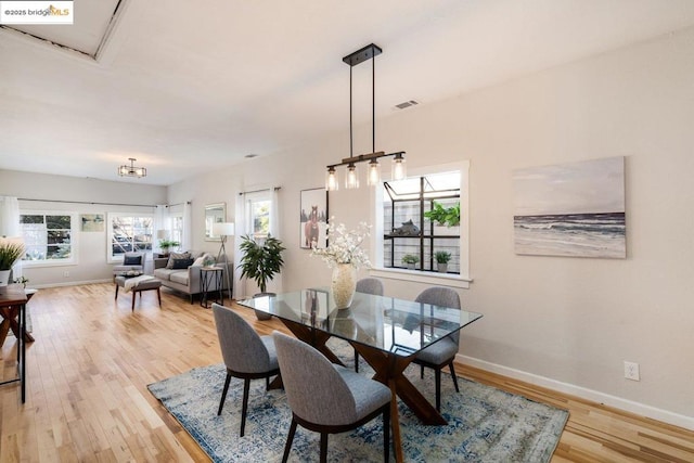 dining space featuring light hardwood / wood-style floors