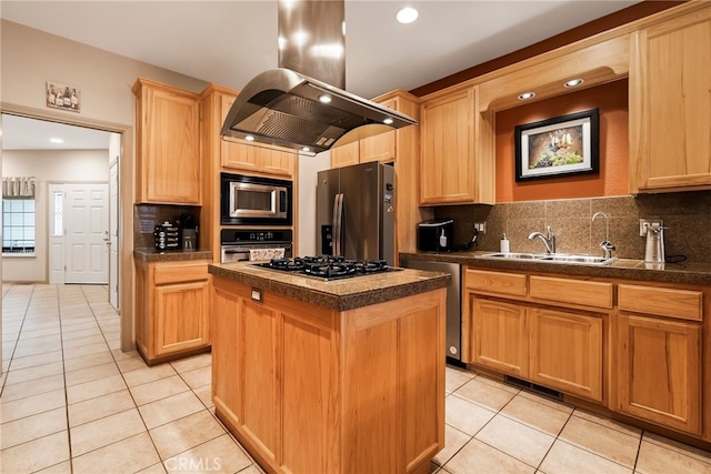 kitchen with island exhaust hood, appliances with stainless steel finishes, light tile patterned floors, a kitchen island, and sink