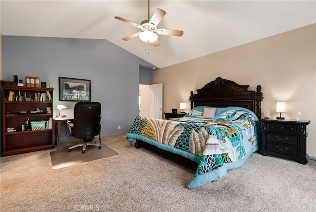 carpeted bedroom featuring ceiling fan and vaulted ceiling