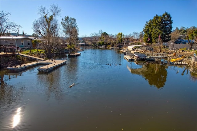 view of water feature with a floating dock