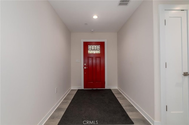 doorway featuring wood-type flooring