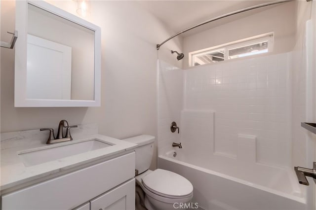 full bathroom featuring vanity, tub / shower combination, and toilet