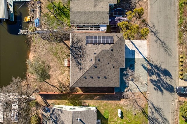 drone / aerial view featuring a water view