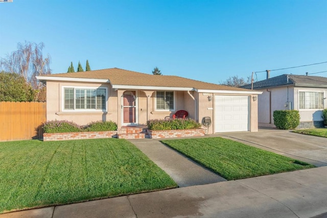 single story home featuring a front yard and a garage