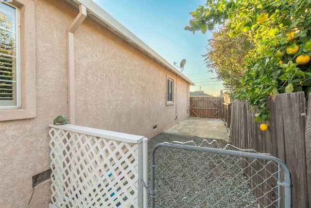 view of property exterior featuring a patio