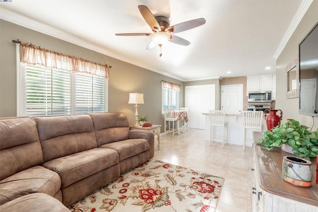 tiled living room featuring ceiling fan and crown molding