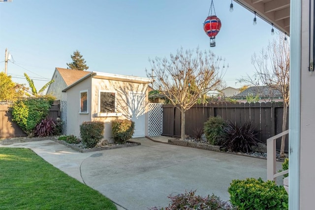 exterior space featuring a patio area and a storage unit