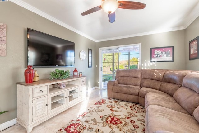 tiled living room with ceiling fan and crown molding