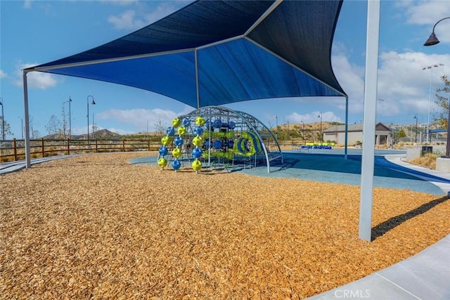 community playground featuring fence