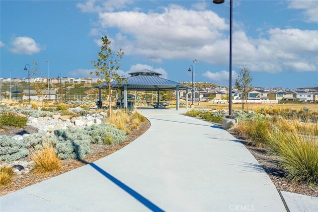 view of community featuring a gazebo and a residential view
