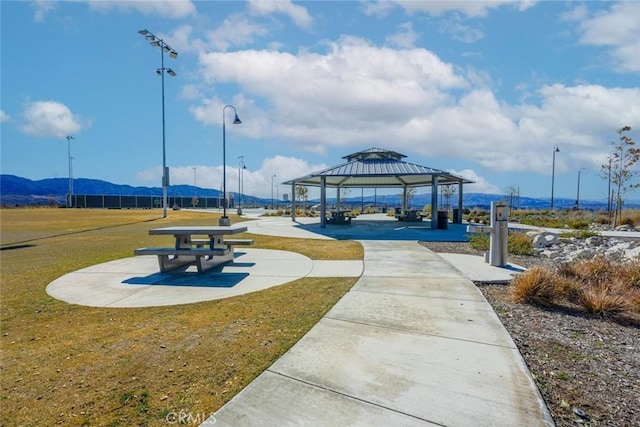 view of home's community featuring a mountain view, a gazebo, and a yard