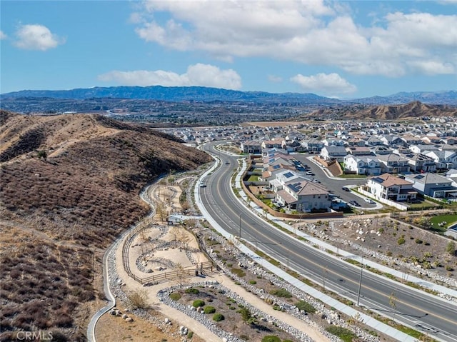 birds eye view of property with a residential view and a mountain view