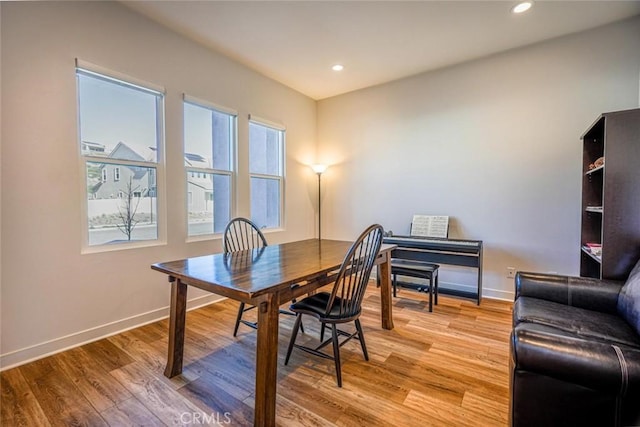 office featuring baseboards, recessed lighting, and light wood-style floors