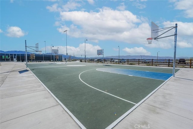 view of basketball court featuring a mountain view