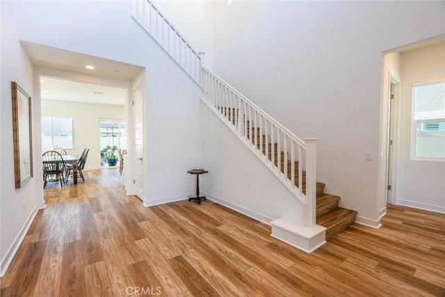 stairway with wood-type flooring