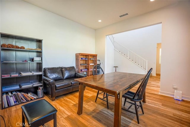 office area with recessed lighting, baseboards, visible vents, and wood finished floors