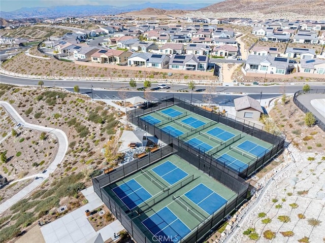 aerial view featuring a mountain view and a residential view