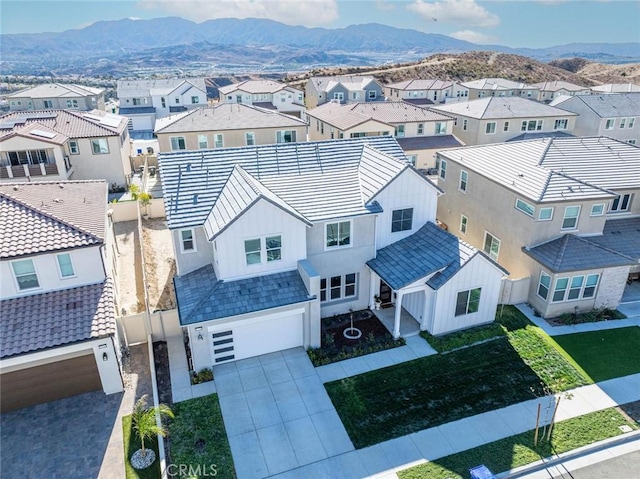 aerial view with a residential view and a mountain view