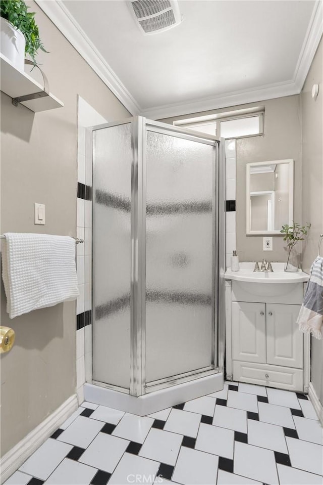 full bath featuring visible vents, ornamental molding, a stall shower, tile patterned floors, and vanity