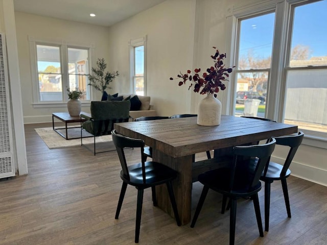 dining space with light hardwood / wood-style flooring