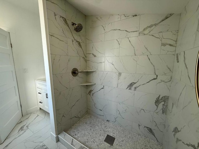 bathroom with a tile shower