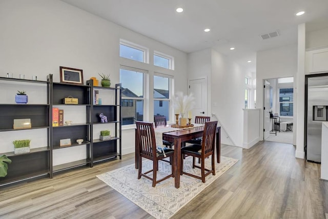 dining room with light hardwood / wood-style flooring