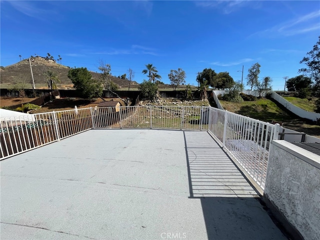 view of patio with fence