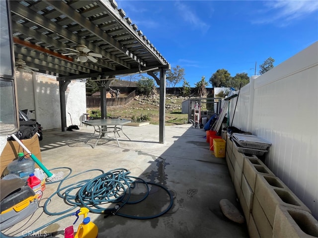 view of patio with a pergola and ceiling fan