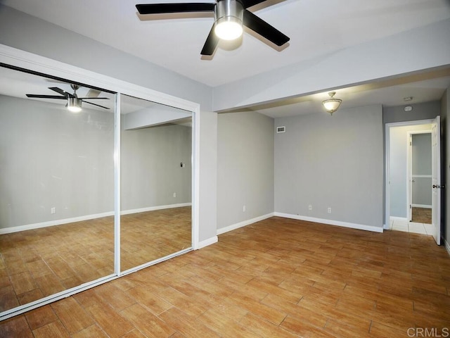 interior space featuring a closet and ceiling fan