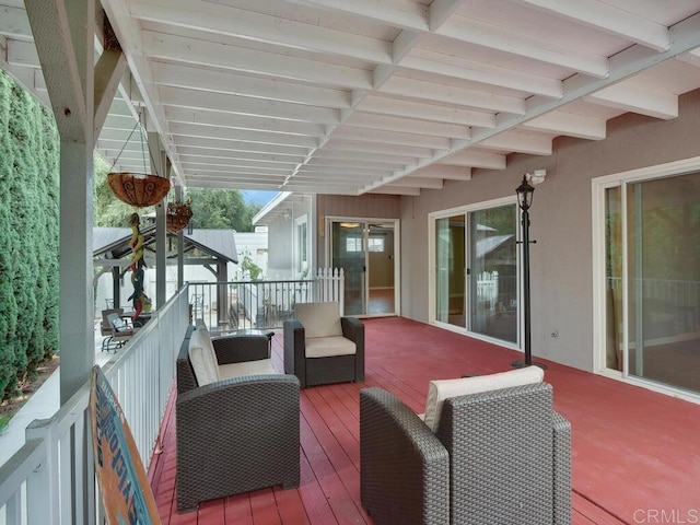 wooden deck featuring an outdoor living space