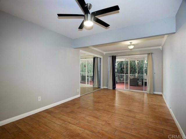 spare room with ceiling fan and light hardwood / wood-style floors