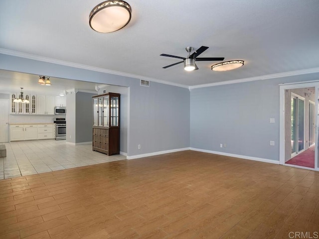 unfurnished living room with ceiling fan with notable chandelier, light wood-type flooring, and crown molding