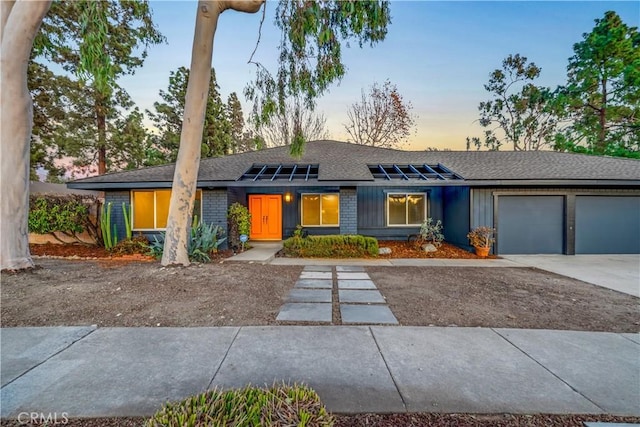 view of front of home with a garage