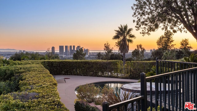 view of home's community with a patio