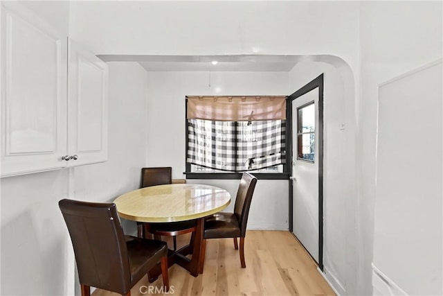 dining space featuring light hardwood / wood-style floors