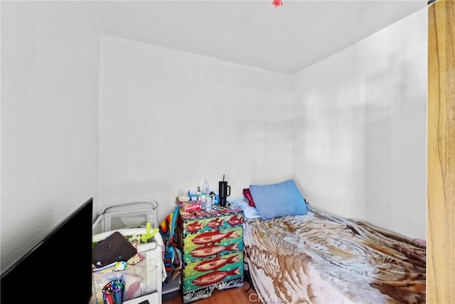 bedroom featuring hardwood / wood-style floors