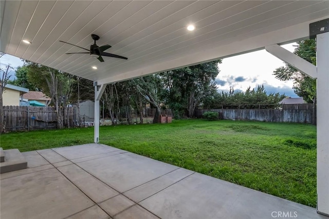 view of patio / terrace with a ceiling fan and a fenced backyard